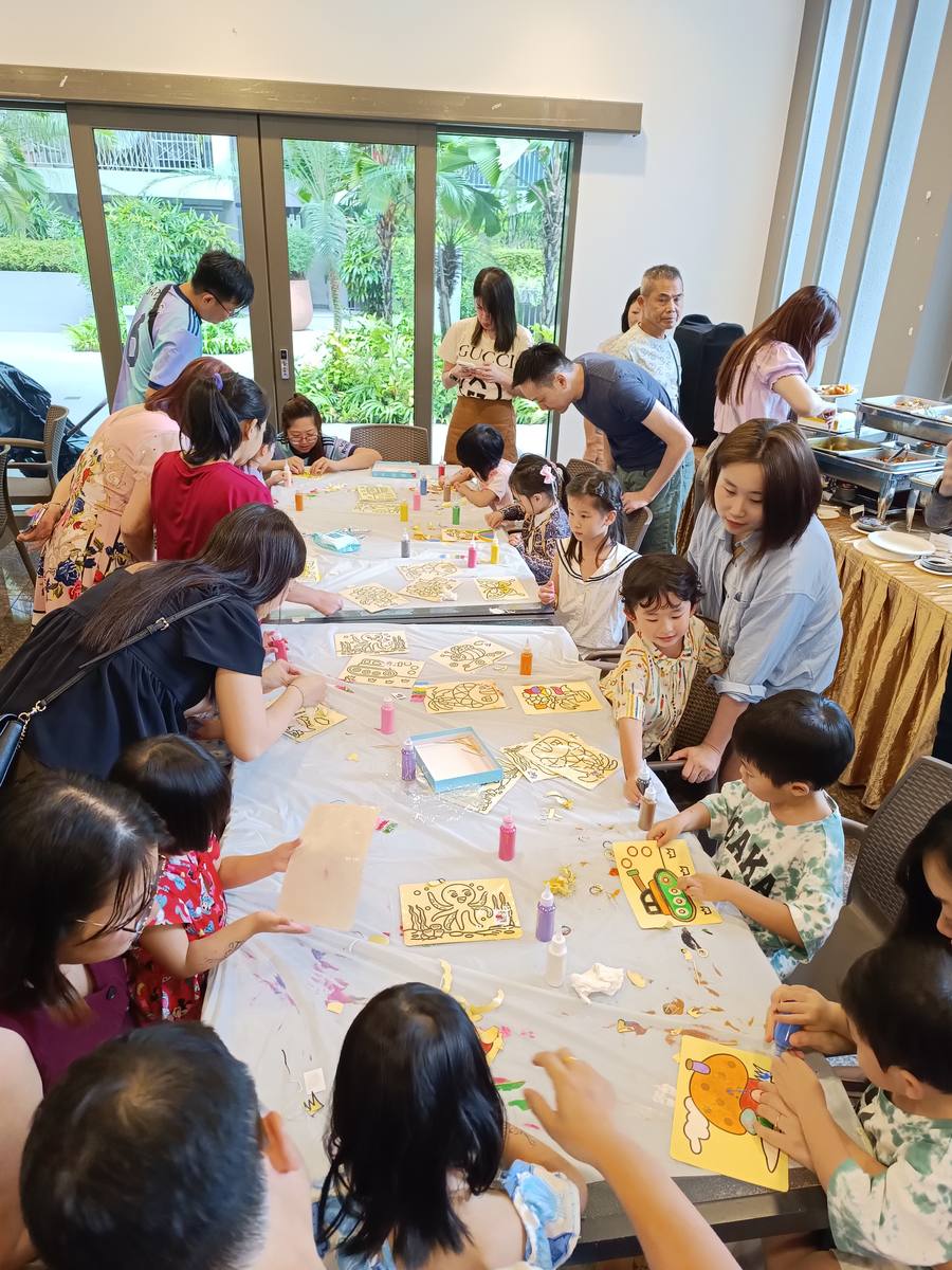 Sand art station with large group